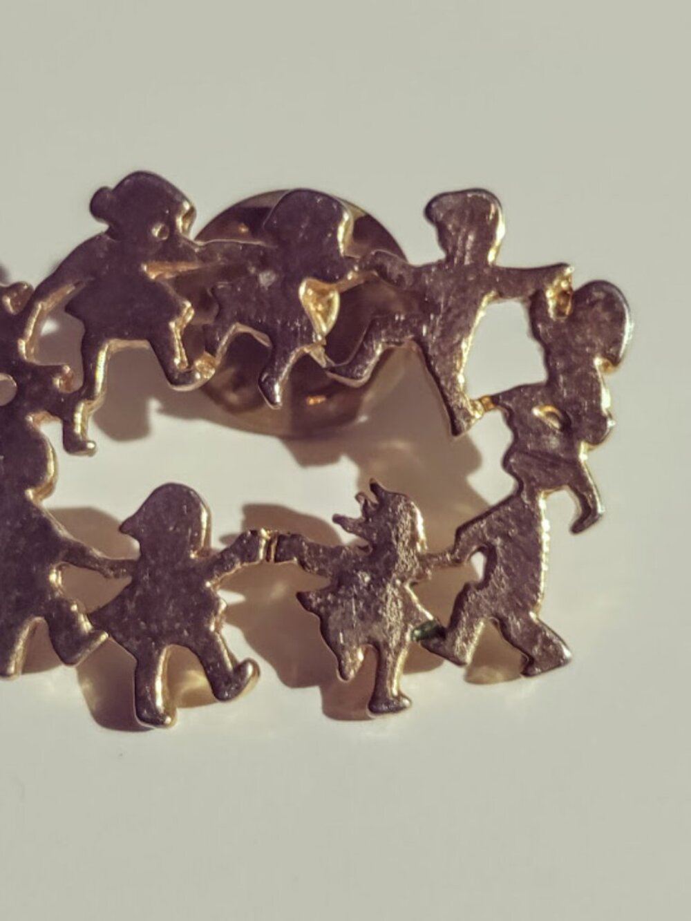 Gold Tone Children Holding Hands Pin